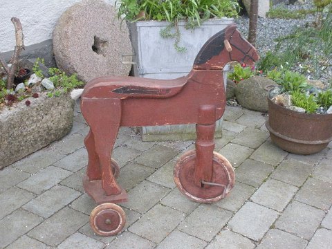 Wooden horse on wheels