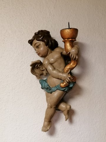 Baroque putti of painted wood