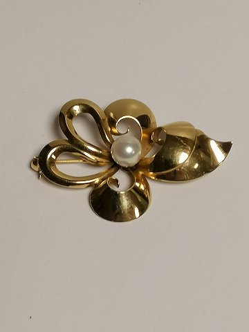 14.karat guld broche med perle
