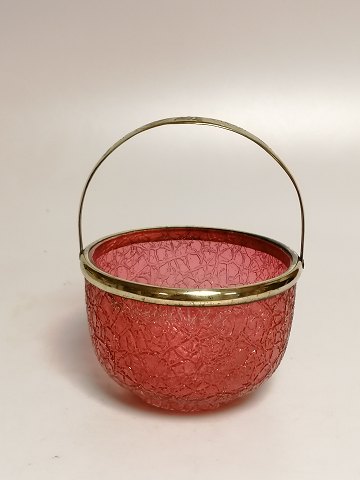 Rød sukkerskål i frossen glas