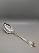 Antique Rococo serving spoon made of three-tower silver